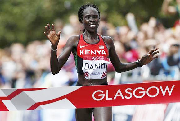 Kenya's Flomena Cheyech Daniel crosses the finish line to win the women's marathon gold medal at the 2014 Commonwealth Games in Glasgow on Sunday