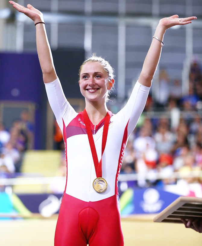 Laura Trott of England celebrates with her gold medal