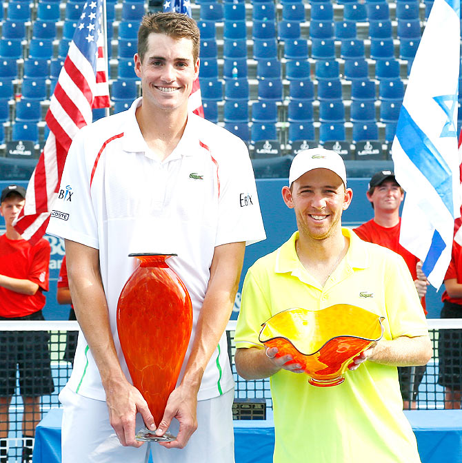 John Isner and Dudi Sela of Israel pose with their trophies after the finals of the BB&T Atlanta Open at Atlantic Station on Sunday