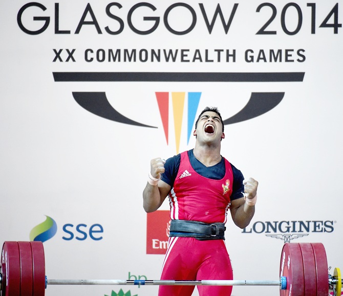 Vikas Thakur of India reacts after winning Silver in the mens 85kg weightlifting at the   Clyde Auditorium during day five of the Glasgow 2014 Commonwealth Games