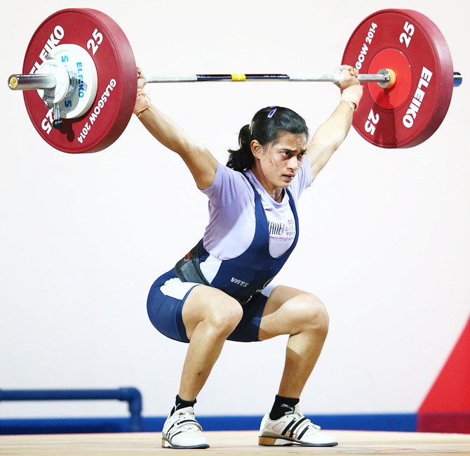 India's Santoshi Matsa lifts in the women's 53kg Group A weightlifting at the Scottish Exhibition and Conference Centre