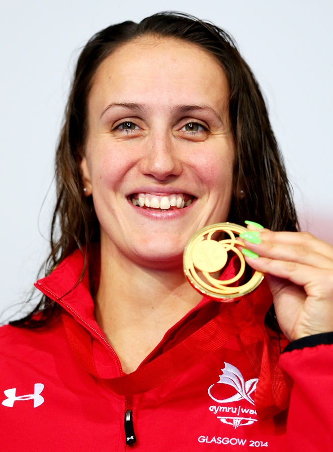 Gold medallist Georgia Davies of Wales poses during the medal ceremony for the women's 50m Backstroke final