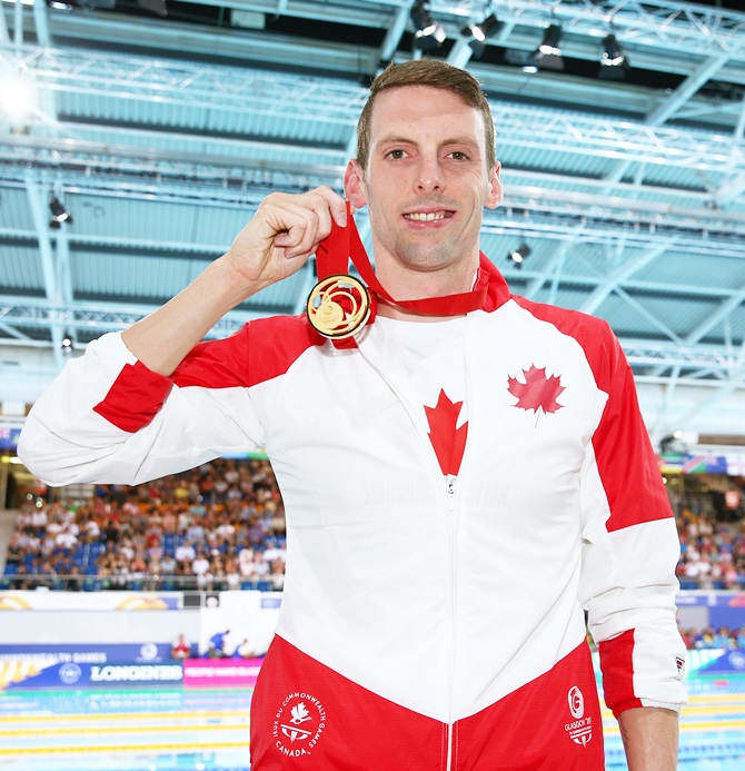 Ryan Cochrane of Canada poses with his gold medal