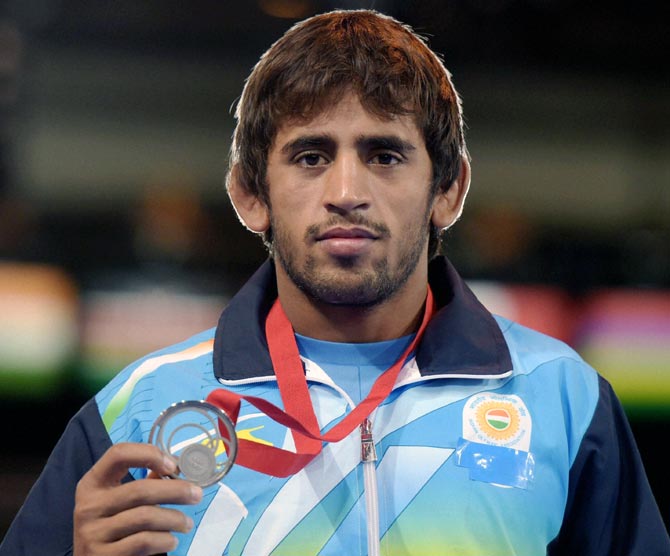India's Bajrang Kumar on the podium with the silver medal