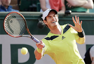 Andy Murray plays a return against Philipp Kohlschreiber on Saturday