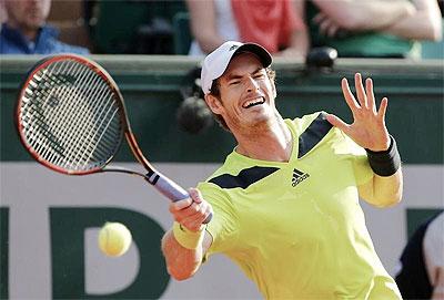 Andy Murray plays a return against Philipp Kohlschreiber on Saturday