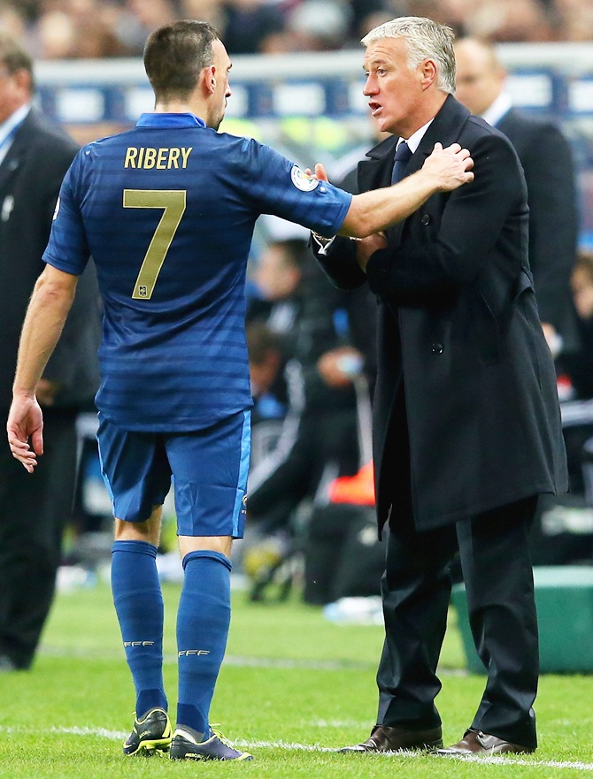 Didier Deschamps, coach of France talks with Franck Ribery
