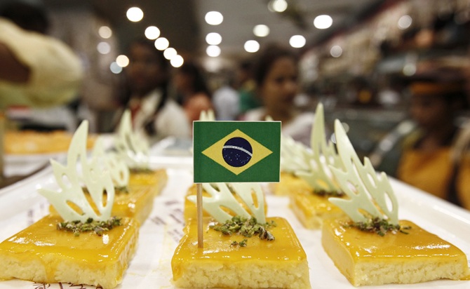 A Brazilian national flag is fixed on a piece of sweet