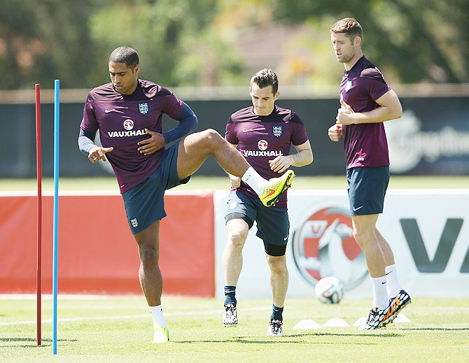 Glen Johnson, Leighton Baines and Gary Cahill in action during an England training session at the Barry University Campus in Miami, Florida on Friday