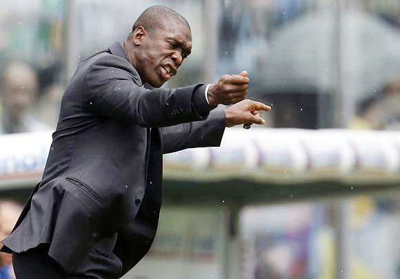 AC Milan's coach Clarence Seedorf gestures 