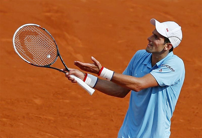 Novak Djokovic of Serbia reacts during his men's singles final match against Rafael Nadal on Sunday