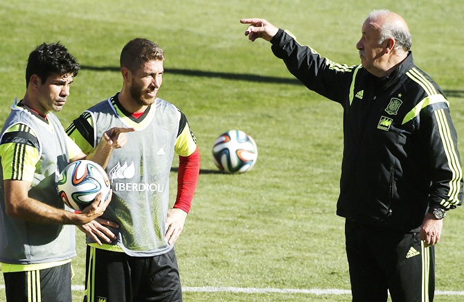 Diego Costa,left, Sergio Ramos,centre, and head coach Vicente del Bosque participate in Spain's national soccer team training