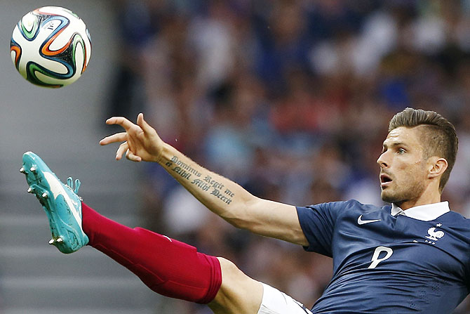 France' s Olivier Giroud controls the ball during their friendly against Jamaica at Pierre Mauroy Stadium in Villeneuve d'Ascq on Sunday