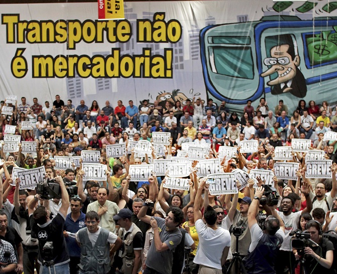 An assembly of Sao Paulo's metro workers debate whether to continue their strike