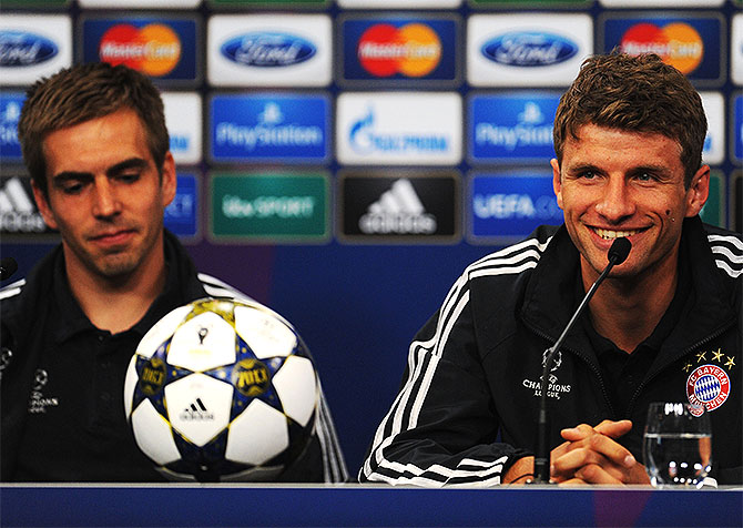 Philipp Lahm (left) and Thomas Mueller during a FC Bayern Muenchen press conference
