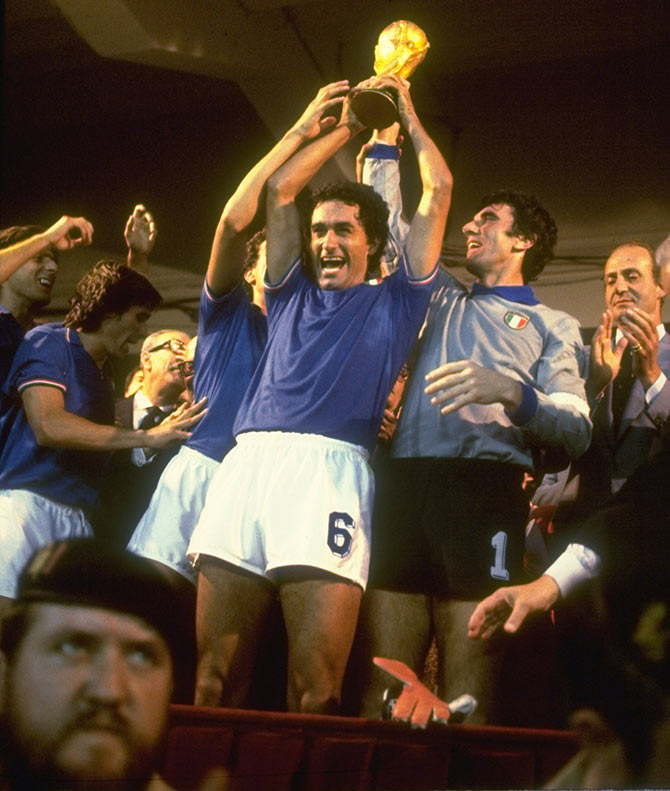 The Italy players hold the trophy aloft after winning the 1982 World Cup final against West Germany
