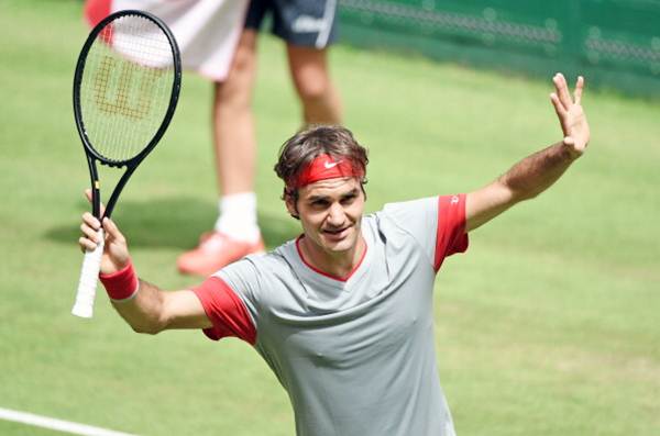Roger Federer celebrates after beating Joao Sousa of Portugal on Day 4 of the Gerry Weber Open in Halle, Germany.