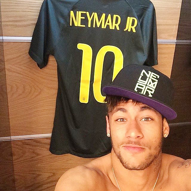 Brazil's Neymar posts a selfie showing off his jersey inside the dressing room before a practice session on Wednesday