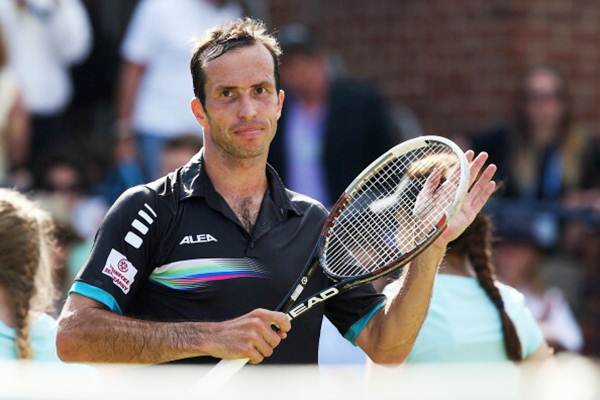 Radek Stepanek of the Czech Republic reacts after defeating Andy Murray of Great Britain during their men's singles match of the Aegon Championships at Queens Club
