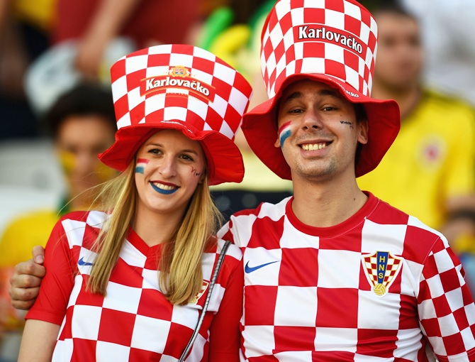 Croatia fans pose before the Brazil-Croatia match at Arena de Sao Paulo