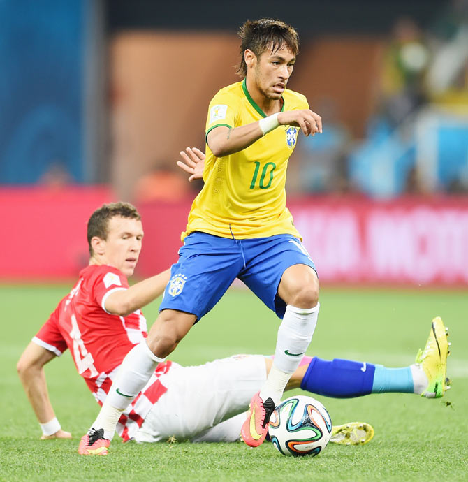 Neymar of Brazil controls the ball as Ivan Perisic of Croatia looks on Thursday