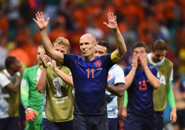 Arjen Robben acknowledges the fans after the Netherlands beat Spain in the 2014 FIFA World Cup match.