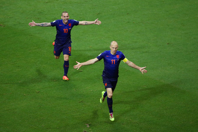 Arjen Robben of the Netherlands (right) celebrates with Wesley Sneijder after scoring the team's fifth goal
