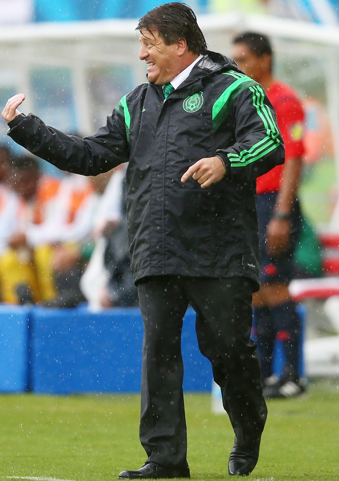 Head coach Miguel Herrera of Mexico reacts