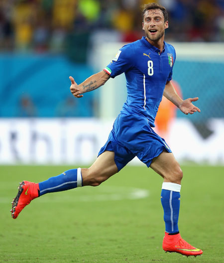 Claudio Marchisio of Italy celebrates scoring his team's first goal against England