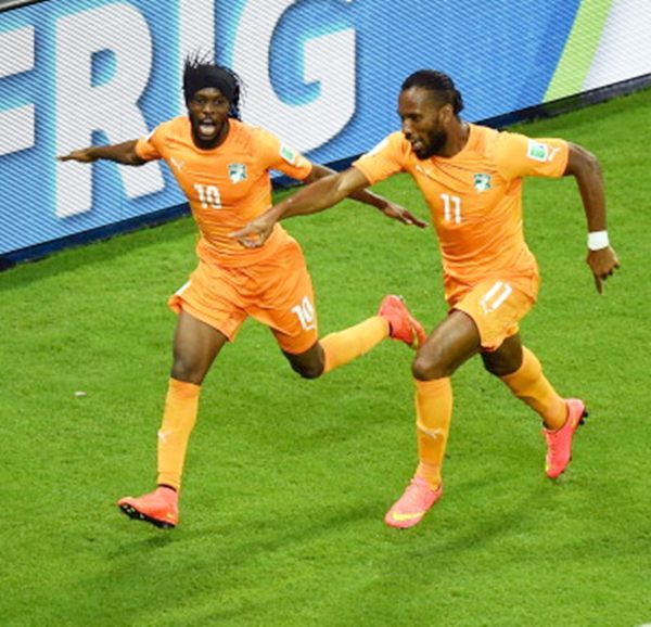 Gervinho of the Ivory Coast (left) celebrates scoring his team's second goal with teammate Didier Drogba
