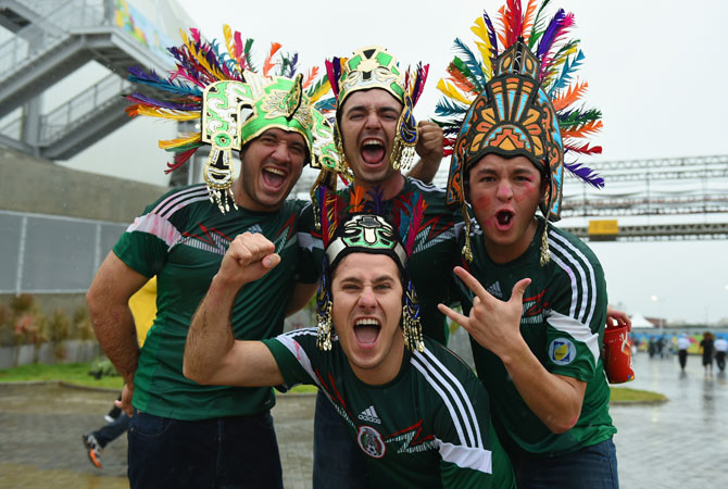 A group of Mexico fans cheer