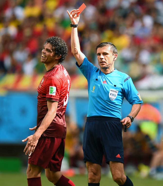 Pepe of Portugal is shown a red card and sent off by referee Milorad Mazic