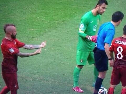 A video grab that went viral on Tuesday shows Portugal's Raul Meireles directing a rude gesture behind the referee's back