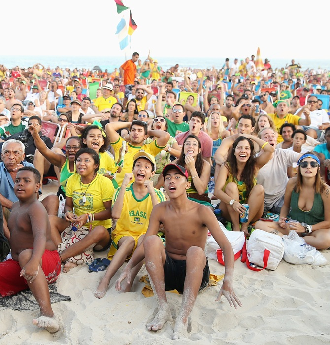 Brazilian Fans gather on Copacabana Beach to watch the Brazil v Mexico match