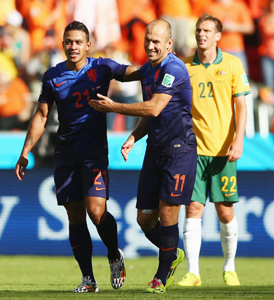 Memphis Depay of the Netherlands (left) celebrates scoring his team's third goal with Arjen Robben, against Australia in Porto Alegre