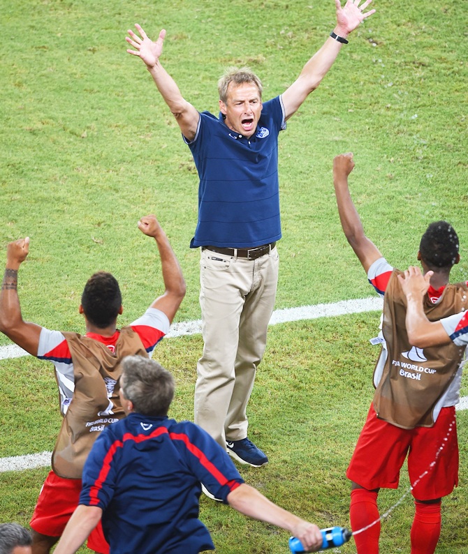 Head coach Jurgen Klinsmann of the United States reacts after defeating Ghana 2-1