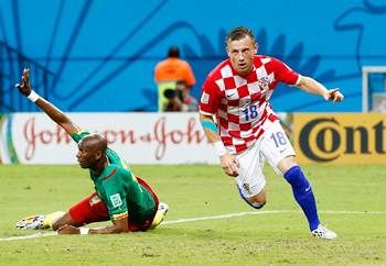 Croatia’s Ivica Olic celebrates after scoring his team's first goal against Cameroon