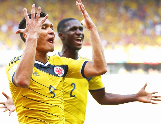 Teofilo Gutierrez of Colombia,left, celebrates scoring his team's second goal   with Cristian Zapata against Greece at Estadio Mineirao on June 14