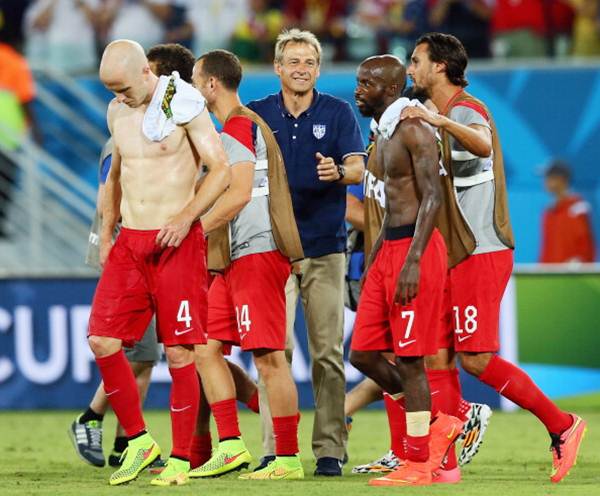United States coach Jurgen Klinsmann with his players after the victory over Ghana
