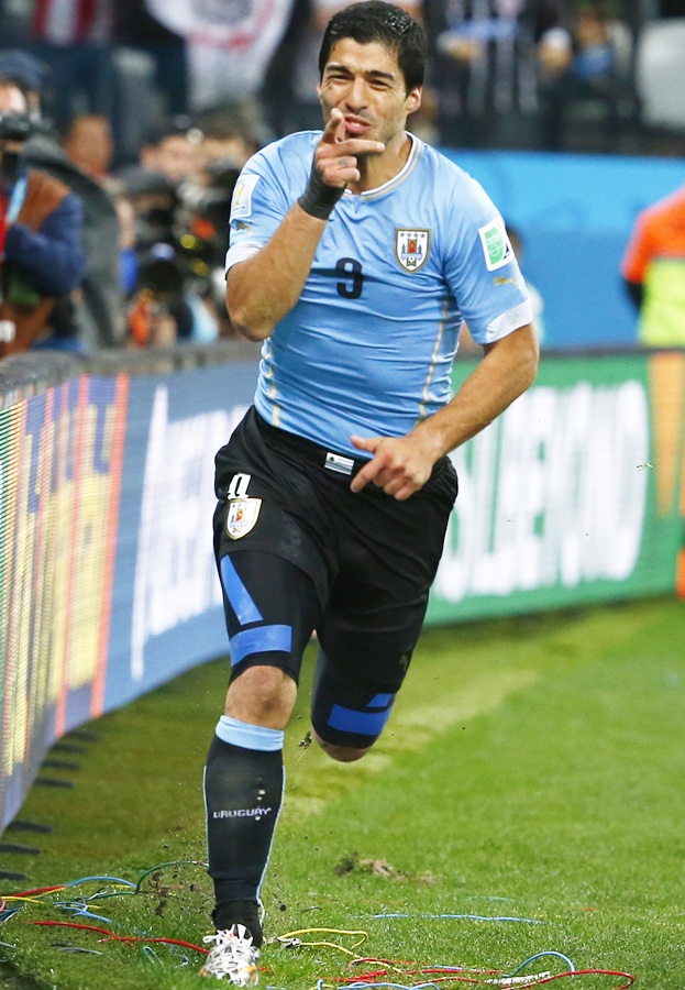Uruguay's Luis Suarez celebrates after scoring his second goal