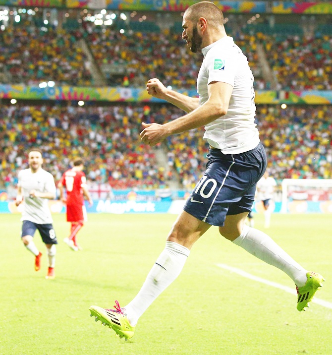 Karim Benzema of France celebrates scoring his team's fourth goal