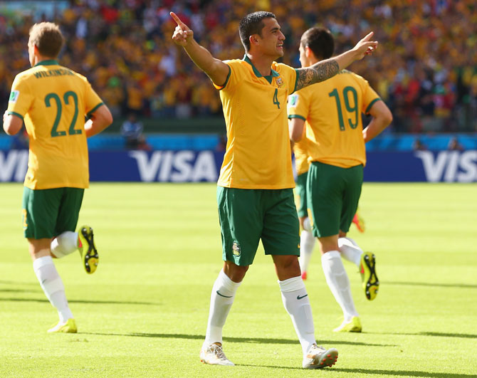 Tim Cahill of Australia celebrates after scoring his team's first goal at the Netherlands