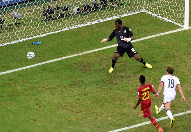 Mario Goetze of Germany scores his team's first goal