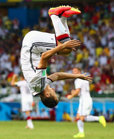 Miroslav Klose celebrates after scoring the record-equalling second goal