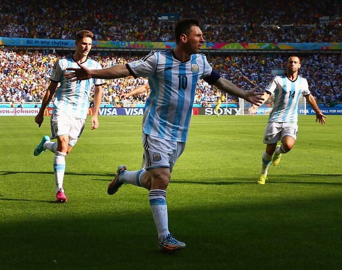 Lionel Messi of Argentina celebrates scoring his team's first goal against Iran