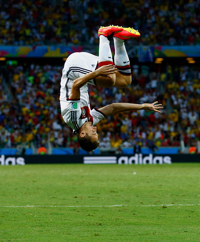 Germany's Miroslav Klose celebrates after scoring against Ghana