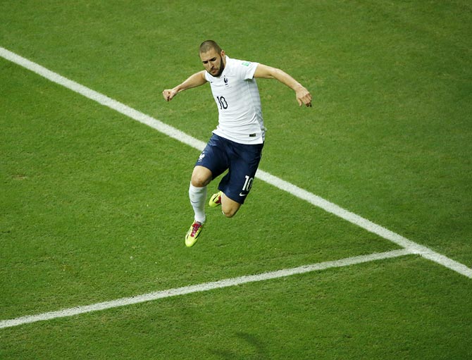France's Karim Benzema celebrates after scoring against Switzerland.