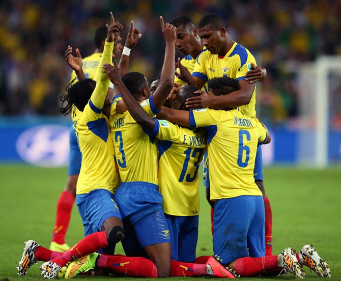 Ecuador's players celebrate after Enner Valencia scores the second goal against Honduras.