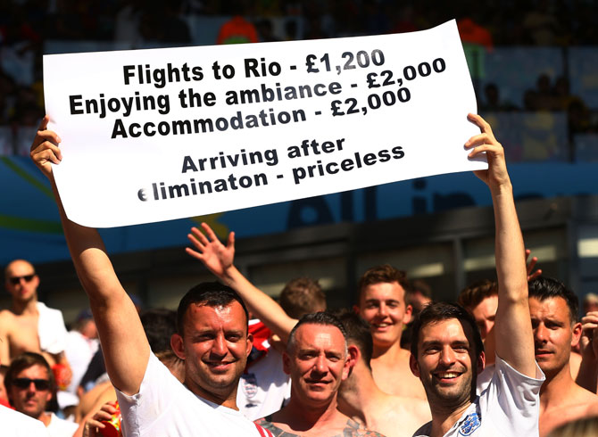 England fans hold up a sign during their match against Costa Rica at Belo Horizonte