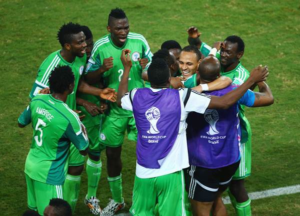 Peter Odemwingie of Nigeria (centre) celebrates scoring his team's first goal with teammates against Bosnia-Herzegovina